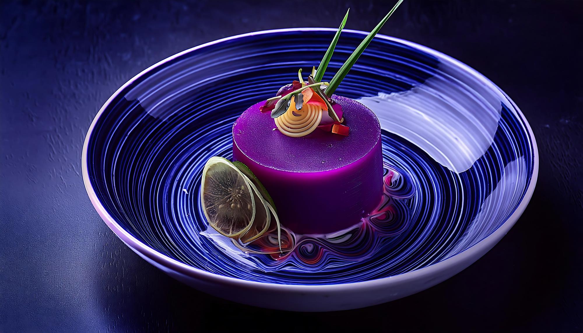 Chef preparing a futuristic plated dish with neon accents